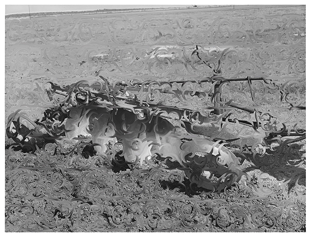 Disk plow drawn by tractor breaking virgin sod. El Indio, Texas